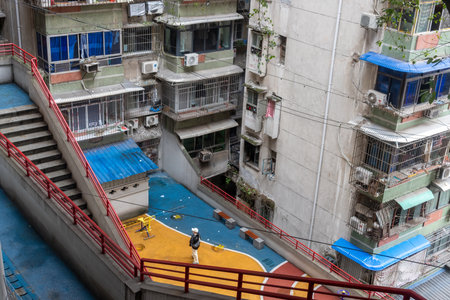 Chongqing, China- 11 Nov 2025: View of Linhua Road Residential Complex in Chongqing, China. It is the most authentic old Chongqing residential area,  famous for its complex and colourful pathwaysのeditorial素材