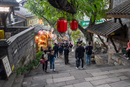 Chongqing, China- 3 Nov 2025: Tourists visit Shibati or Eighteen Stairs, in Chongqing, China. ...