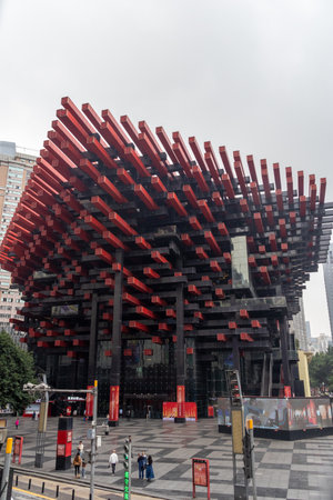 Chongqing, China- 2 Nov 2025: View of Chongqing Art Museum in China. It is recognized for its distinctive architecture featuring a pattern of red and black beams inspired by chopsticks and hot pot.のeditorial素材