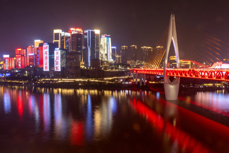 Chongqing, China- 2 Nov 2025: Stunning nightview of Qiansimen Bridge and Chongqing downtownt, China. Chongqing night view is incredible beautiful, breathtakingly dazzling, absolutely must seeのeditorial素材