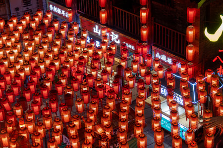 Chongqing, China- 10 Nov 2025: Red lanterns light up at  Shibati or Eighteen Steps in Chongqing, China. It is charming historic street, blending traditional architecture with bustling modern city lifeのeditorial素材
