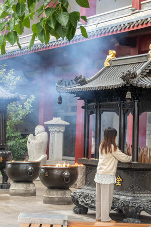 Chongqing, China- 8 Nov 2025: People visit to Ciyun Temple in Chongqing, China. Known for its serene environment and traditional architecture, the temple offers a peaceful retreat from bustling cityのeditorial素材
