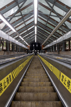 Chongqing, China- 7 Nov 2025: Huangguan Escalatort in Chongqing, China. With a height of about 53 metres, it connects the Chongqing railway station at Caiyuanba to Lianglukou metro station.のeditorial素材