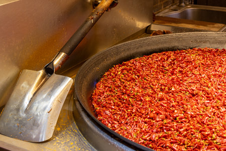 Chongqing spicy chilli sauce for sale at Chinese night markets in Chongqing, China.のeditorial素材