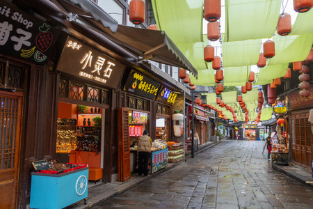 Chongqing, China- 11 Nov 2025: View of Ciqikou or Porcelain Port in Chongqing, China. It features ancient streets with Ming-Qing architecture, Baolun Temple, and a historic portのeditorial素材