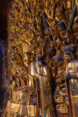 Dazu stone carving of the Thousand-Hand Guanyin located at the Baoding mountain Rock Carvings in Chongqing, China.  It is a masterpiece of Chinese grotto art, known for its stunning detailsの写真素材