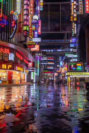 Chongqing, China- 3 Nov 2025: Cyberpunk vibe of Deyi World in Chongqing, China. Deyi World is renowned for its vibrant cyberpunk atmosphere, illuminated by dazzling LED-neon signsのeditorial素材