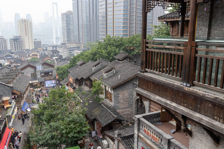 Chongqing, China- 3 Nov 2025: Wooden architecture at Shibati or Eighteen Stairs, in Chongqing, China. Shibati is a historic district and street  known for its traditional architecture,のeditorial素材