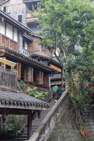 Chongqing, China- 3 Nov 2025: Shibati or Eighteen Stairs which a traditional-style scenic area located in Chongqing, China. It has narrow alleyways, old stone steps and ancient Chinese architectureのeditorial素材
