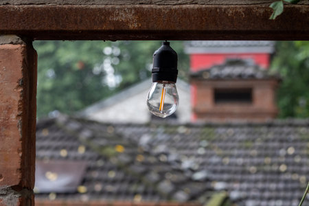 Lightbulb hang in the old district area.の写真素材