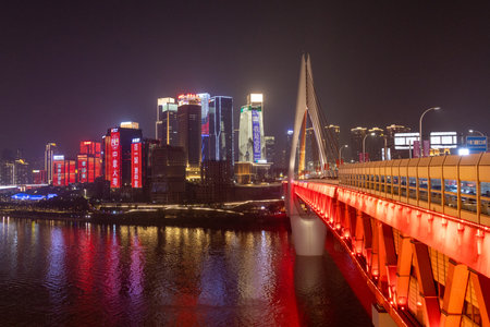 Chongqing, China- 2 Nov 2025: Stunning nightview of Qiansimen Bridge and Chongqing downtownt, China....