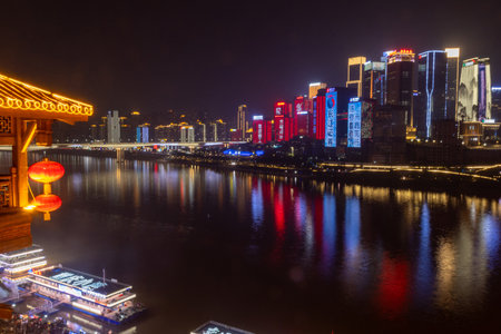Chongqing, China- 2 Nov 2025: Stunning nightview of Qiansimen Bridge and Chongqing downtownt, China. Chongqing night view is incredible beautiful, breathtakingly dazzling, absolutely must seeのeditorial素材