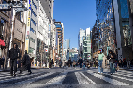 Tokyo, Japan-28 Dec 2025: Ginza main street, Chuo Dori, becomes a pedestrian-only zone on weekend...