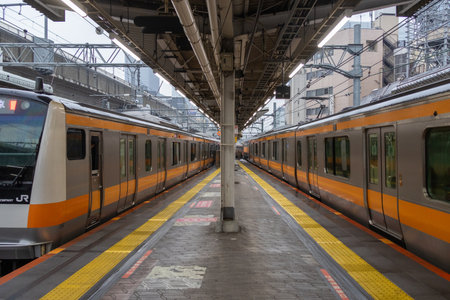 Tokyo, Japan - 24 Dec- 2025: Train platform in Kanda station, Tokyo. Kanda offers a unique...