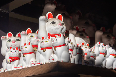 Tokyo, Japan - 26 Dec- 2025: Beckoning cat or maneki-neko figures located inside Gotokuji Temple, located in the Setagaya ward of Tokyo. There are believed to bring good luck, fortune, and happinessのeditorial素材