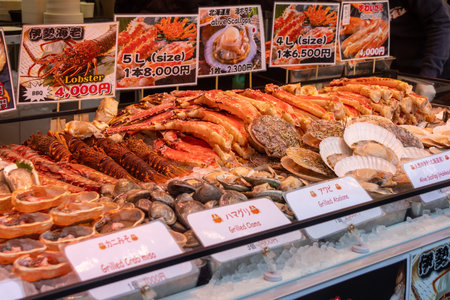 Tokyo, Japan-28 Dec 2025: Various seafood sold at Tsukiji Market in Tokyo. Tsukiji Market i  primarily a vibrant Outer Market focused on retail, restaurants, and street foodのeditorial素材