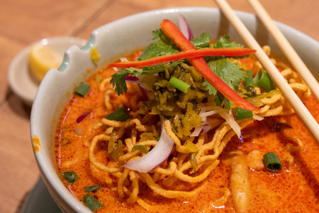 Khao Soi, a curry noodle soup that comes from the city of Chiang Mai in Northern Thailand. It is...