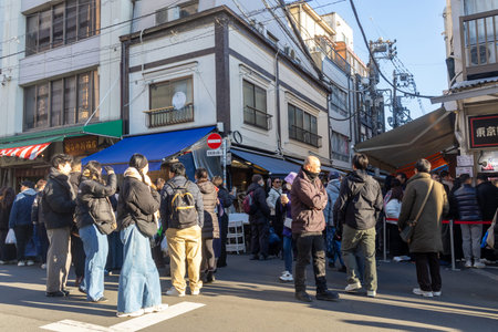 Tokyo, Japan-28 Dec 2025: Tourists visit to Tsukiji Outer Market in Tokyo. The market remains a...