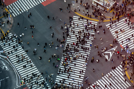Tokyo, Japan- 16 Dec 2025: Stunning perspective looking down directly onto the iconic Shibuya...