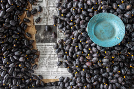 Kuching, Malaysia- 26 Jan 2026: Dabai (Canarium odontophyllum) sold in local market in Kuching, Malaysia. It is sometimes called the tropical olive because they are a fatty fruitのeditorial素材