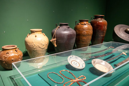 Kuching, Malaysia - 28 Jan 2026: Historical porcelain showcase inside the Borneo Cultures Museum in...
