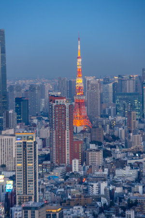 Tokyo, Japan- 16 Dec 2025: View of Tokyo Tower from Shibuya Sky tower. Shibuya Sky stands as a...