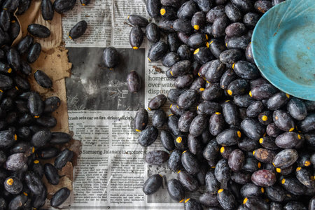 Kuching, Malaysia- 26 Jan 2026: Dabai (Canarium odontophyllum) sold in local market in Kuching, Malaysia. It is sometimes called the tropical olive because they are a fatty fruitのeditorial素材