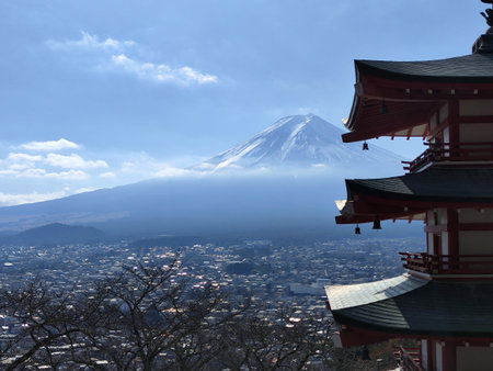 Fujiyoshida, Japan- 19 Dec 2025: Mount Fuji and Chureito Pagoda from Arakurayama Sengen Park in Fujiyoshida, Japan. The park offers a stunning view of Mount Fuji, especially framed by pagodaのeditorial素材