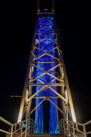 Kuching, Malaysia- 28 Jan 2026: Satok Suspension Bridge in Kuching, Malaysia. With colored lights installed to illuminate the structure at night, the landmark turn into an important tourist attractionのeditorial素材