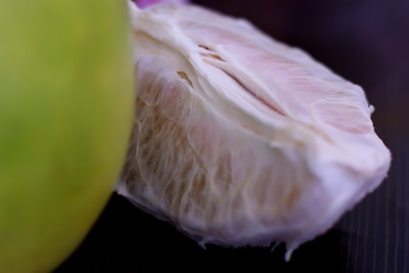 Pomelo is a huge tropical fruit. Its skin is green, rough, and very thick. In Taiwanese tradition, pomelo is used for celebrating Moon Festival.の写真素材