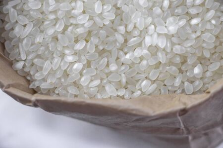 White rice in paper bag