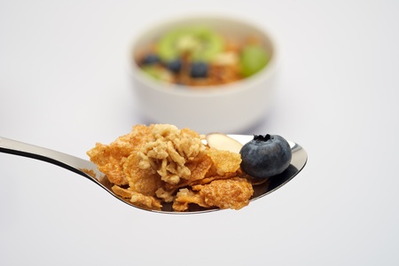 Close up of muesli cereal on spoon 