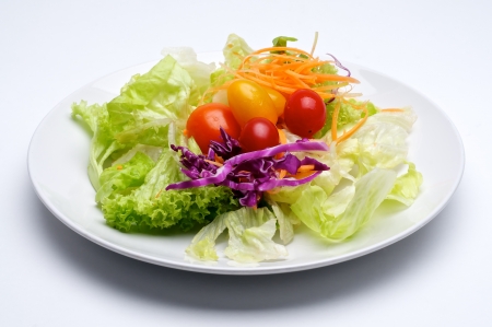 Fresh salad with lettuce,tomato, carrotsの写真素材