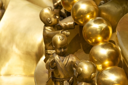 Golden monks in Da Nam Temple in Vietnamの写真素材