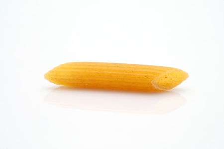 This is a long hollow tube shaped rigatoni Pasta on white background.の写真素材