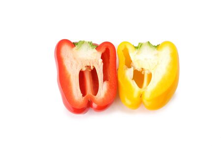 cut yellow and Red bell pepper in white backgroundの写真素材