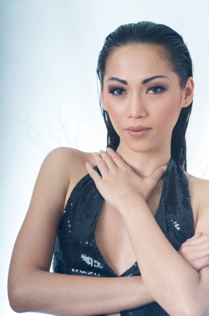 Portrait of beautiful Asian woman in black dressの写真素材