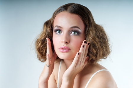 Portrait of a stylish teenager model surprised poseの写真素材