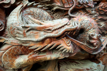 Wooden brown carved Dragon in Guilin Chinaの写真素材