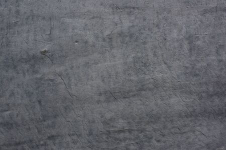 Texture of dark gray slate wall
