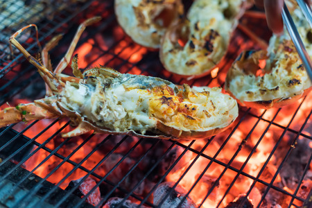 Seafood Lobster dinner on barbecue grillの写真素材
