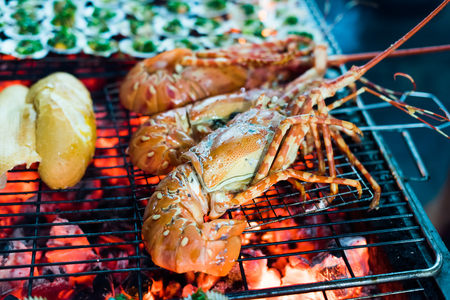 Seafood Lobster dinner on barbecue grillの写真素材