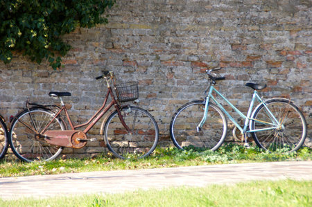 Bicycles in the shadow in Burano, Veniceの写真素材