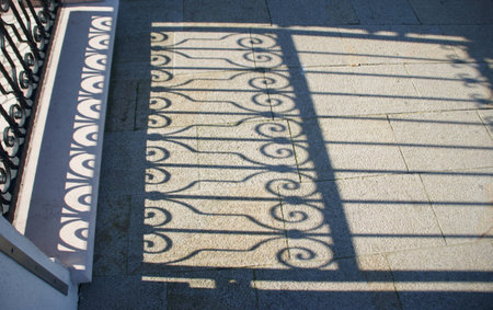 Shadows of an iron gate in Burano, Veniceの写真素材