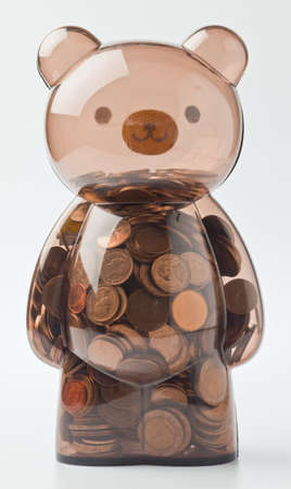saving money in bear bottleの写真素材