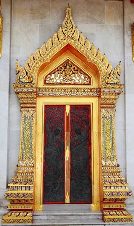 Carved Wood Door at wut benjamabopit Bangkok Thailandの写真素材