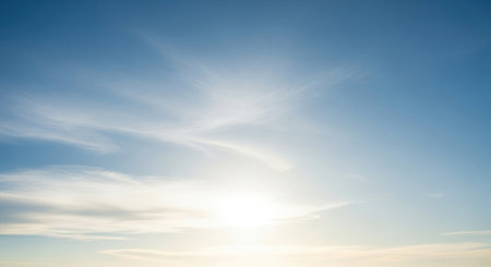 Blue sky background with tiny clouds. Panoramic image of blue sky with tiny clouds.の素材