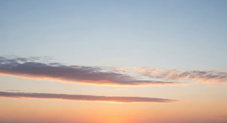 Sunset sky background. Panoramic view of the sunset sky.の素材