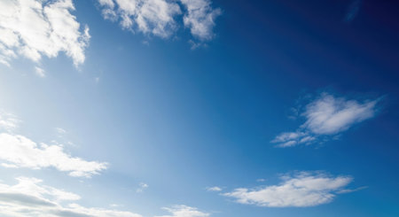 Blue sky background with tiny clouds, blue sky background with tiny cloudsの素材
