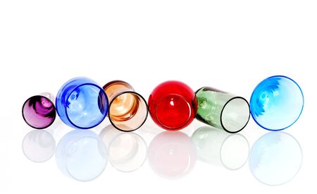 Abstract image of colored circles with crystal glasses and reflection on white backgroundの写真素材
